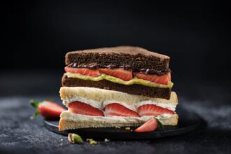 Marks & Spencer brings back its viral strawberry sandwich and launches a new chocolate, strawberry & pistachio version, sending shoppers into a frenzy.