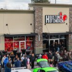 A US fried chicken chain whose hottest spice level requires customers to sign a waiver is launching in Britain - with plans to open 50 restaurants across the UK within three years.