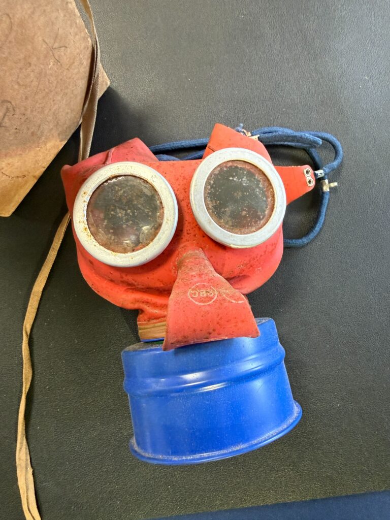 Rare World War II "Mickey Mouse" gas mask designed to look less scary for children discovered after spending 80 years hidden in wardrobe of original owner.