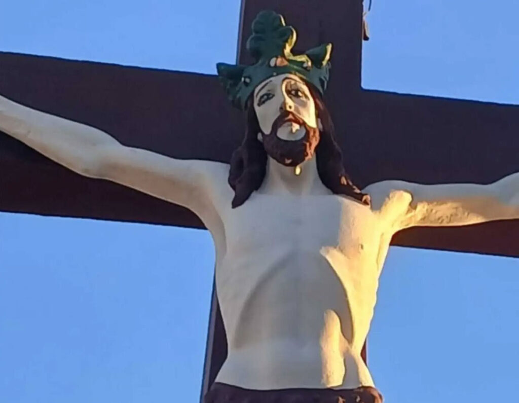 Religious statues of Jesus were covered up after an amateur restoration left them with arched eyebrows, thick eyelashes and bright red lips - drawing comparisons to the infamous Monkey Christ.