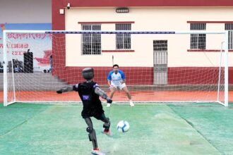 A robot striker demolished a former World Cup goalkeeper in a charity penalty shootout - she said the ball speed was "absolutely insane" and she simply could not react in time.