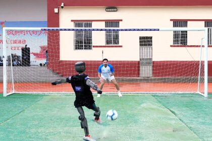 A robot striker demolished a former World Cup goalkeeper in a charity penalty shootout - she said the ball speed was "absolutely insane" and she simply could not react in time.