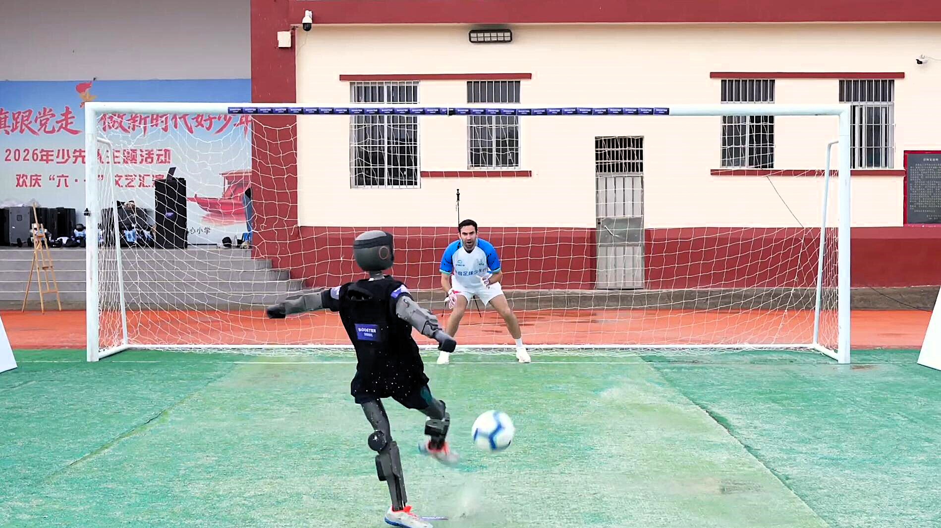 A robot striker demolished a former World Cup goalkeeper in a charity penalty shootout - she said the ball speed was "absolutely insane" and she simply could not react in time.