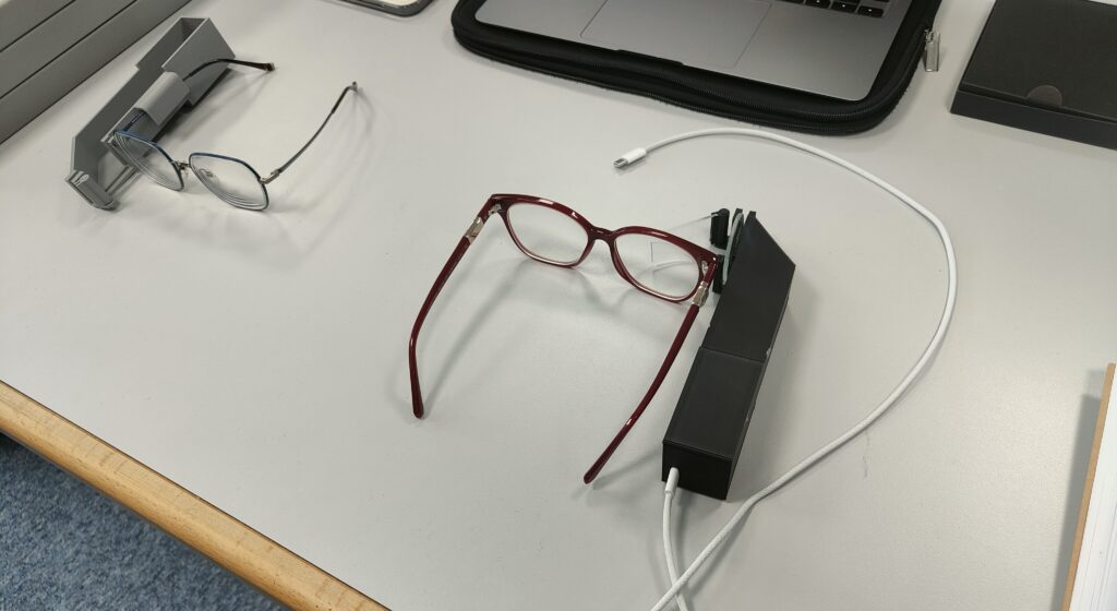 A student has created AI-powered glasses that translate any language into real-time subtitles before your eyes - for just £30, a fraction of similar devices costing thousands.