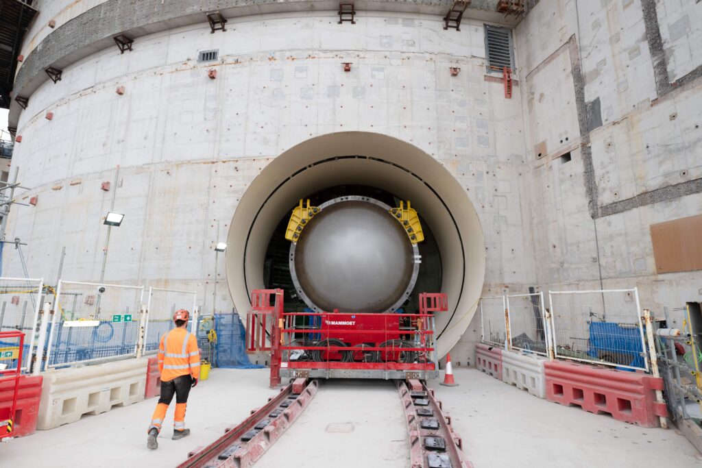 World's biggest crane "Big Carl" completes huge milestone by lifting giant reactor into place at Britain's newest nuclear power station Hinkley Point C in Somerset.