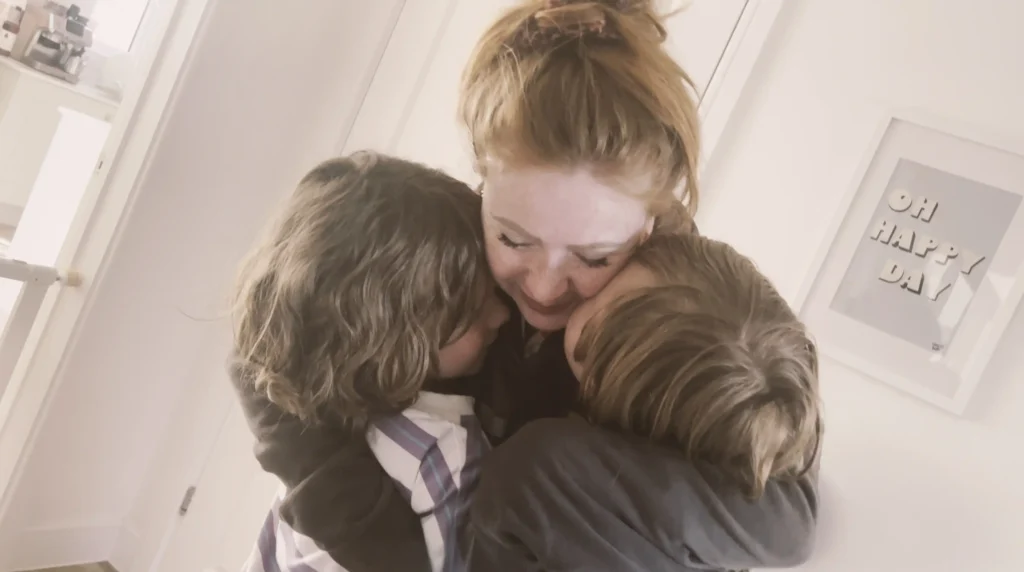 A seven-year-old and his 10-year-old brother took on the UK Three Peaks Challenge in 72 hours to raise money for their mum's Crohn's battle - and may bag a world record.