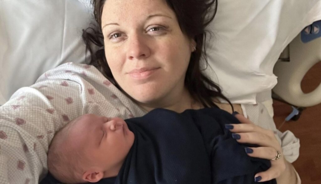 A mum says her eight-month-old baby is already wearing clothes for five-year-olds and has cost $5,000 in outgrown equipment - adding that she carries him "with hope and prayer".