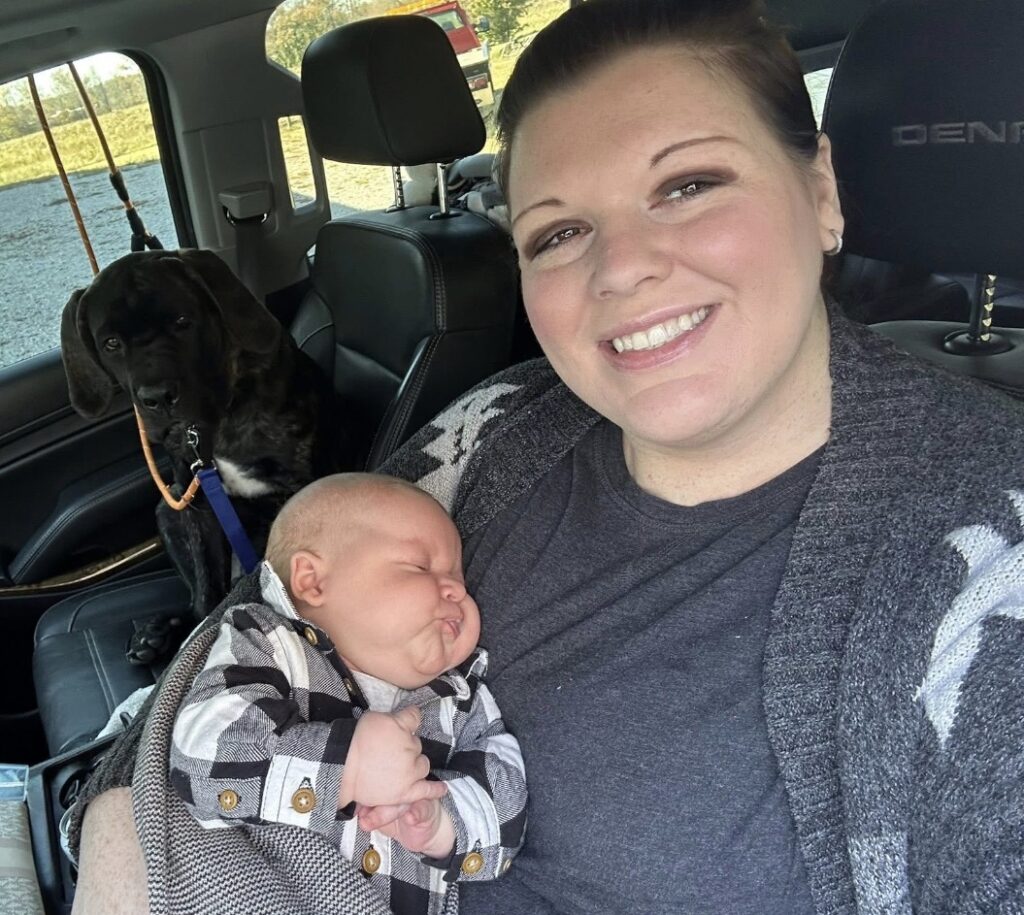 A mum says her eight-month-old baby is already wearing clothes for five-year-olds and has cost $5,000 in outgrown equipment - adding that she carries him "with hope and prayer".