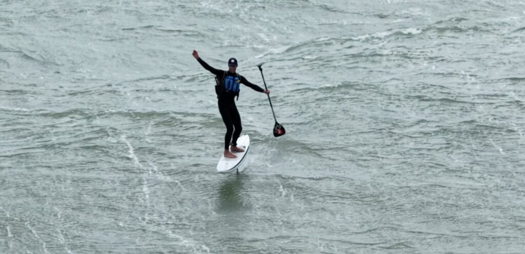 Adventurer Guy Bridge foil-boarded 250 miles along the UK coast in under 20 hours - even joined for one leg by his eight-month pregnant wife. Next up: the Channel.