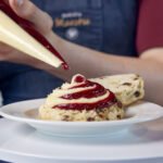 Costa Coffee brings back jam and cream scones after 5 years! Try the new 50/50 scone settling Britain's cream tea debate. Available now at 1000+ stores.