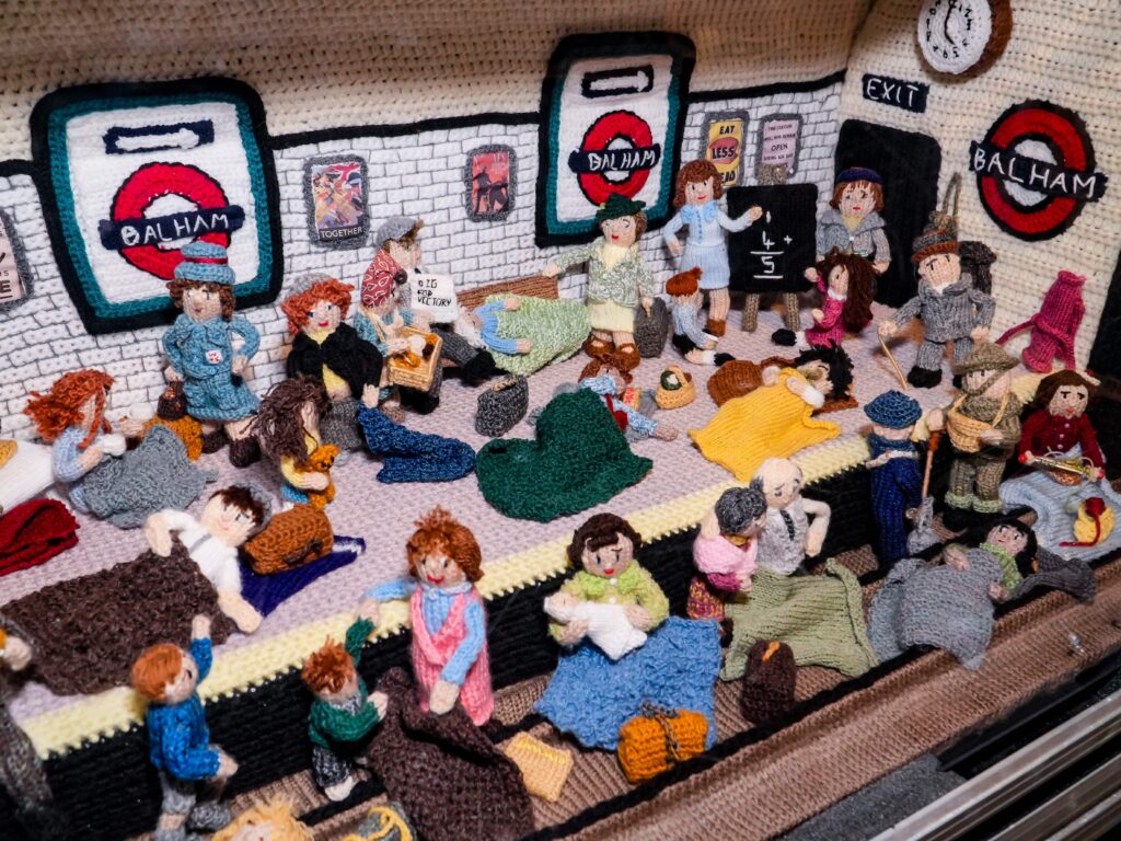An extraordinary 80-metre exhibition depicting the D-Day landings, Spitfires and the Blitz has been created entirely from knitting and crochet by 200 volunteers.
