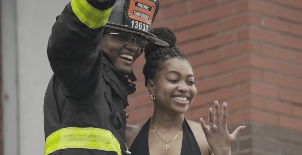 A firefighter-in-training left his girlfriend speechless after turning a daring abseil exercise into a surprise marriage proposal at an FDNY event in New York.