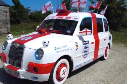 A dad-and-son duo have transformed an old London taxi into an England-themed supercar covered in St George's crosses and Three Lions badges for the World Cup.