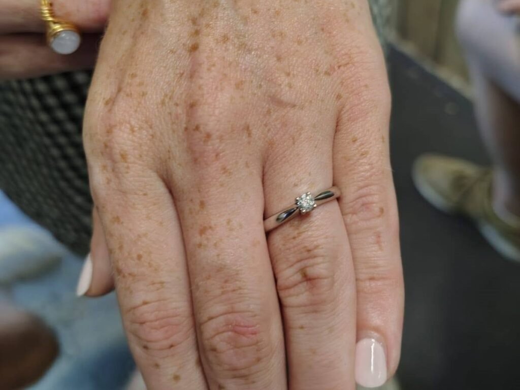 Couple travel eight hours to get engaged in a sloth enclosure - beside the animal she adopted four years ago