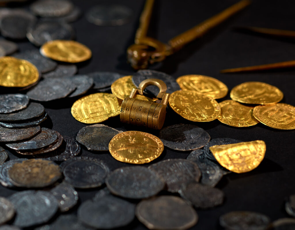 Metal detectorist, 69, uncovers a huge hoard of 16th century gold coins after two decades searching a Welsh beach for a Spanish shipwreck.