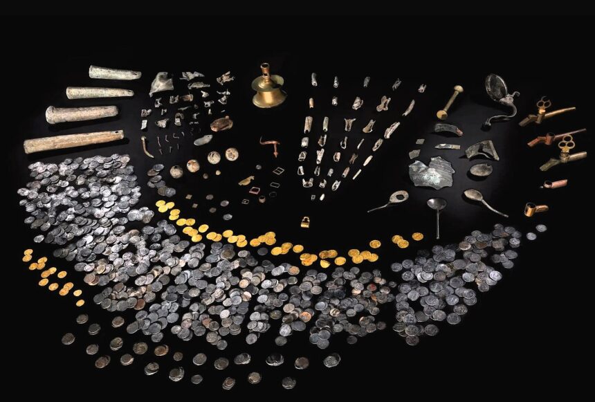 Metal detectorist, 69, uncovers a huge hoard of 16th century gold coins after two decades searching a Welsh beach for a Spanish shipwreck.