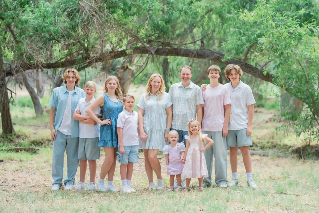 A YouTube mum of eight has revealed her family's eye-watering $15,000-a-month bills - yet still insists kids are 'cheap' and there's 'no excuse' not to have them.