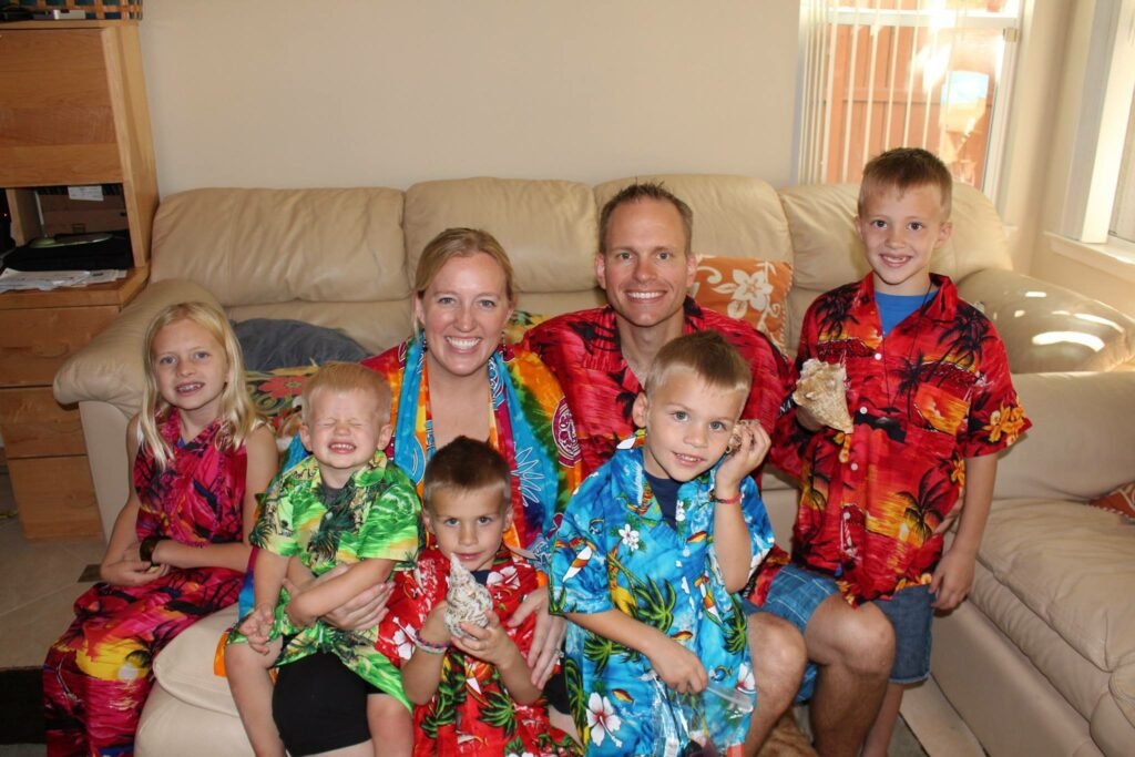 A YouTube mum of eight has revealed her family's eye-watering $15,000-a-month bills - yet still insists kids are 'cheap' and there's 'no excuse' not to have them.
