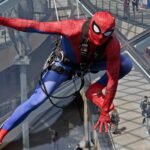 Shoppers did a double take after spotting "Spider-Man" scaling the vast glass dome of Trinity Leeds - but the web-slinger was really a window cleaner in costume.