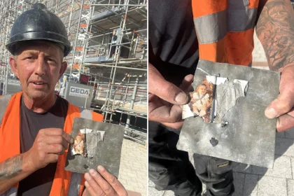 A roofer was left fighting back tears after uncovering a photo of his teenage son he had secretly hidden beneath a roof slate 24 years earlier - with his son working beside him.