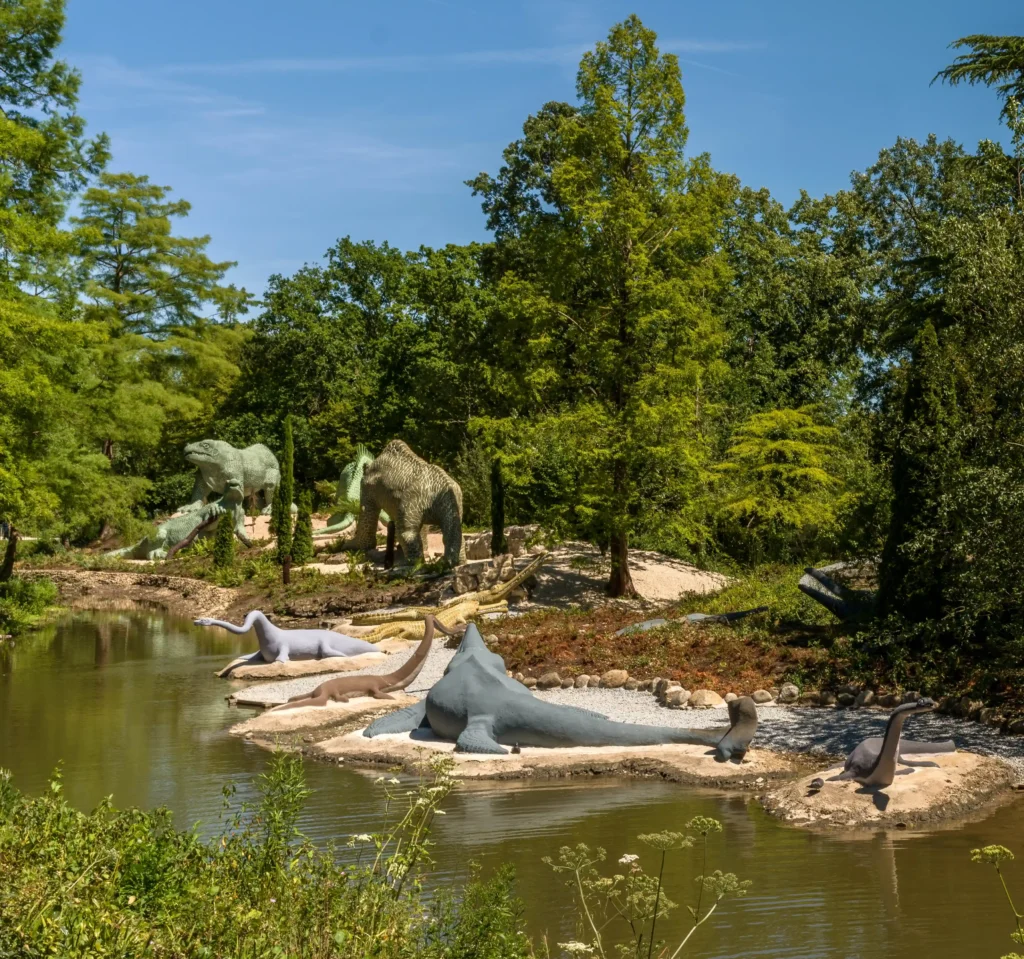 The world's first life-sized dinosaur sculptures have been saved from the at-risk register after a £27m project restored the 172-year-old Victorian icons.