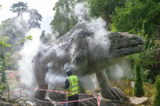 The world's first life-sized dinosaur sculptures have been saved from the at-risk register after a £27m project restored the 172-year-old Victorian icons.