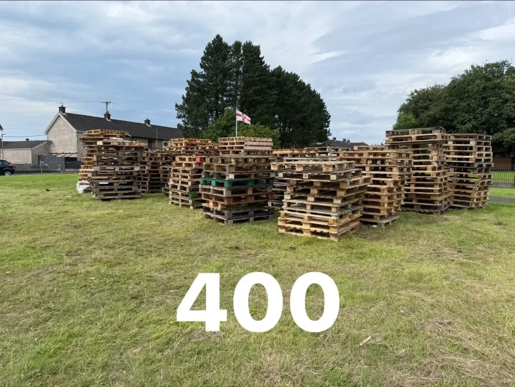 World's tallest bonfire towers at 200 feet ahead of being set alight this weekend, built entirely by hand from over 20,000 wooden pallets in Belfast.