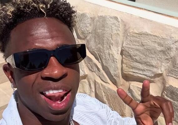 Arsenal target Vinicius Junior was filmed crashing a golf cart into a flowerbed on a luxury break in Jamaica - his girlfriend Virginia Fonseca laughed as she filmed it.