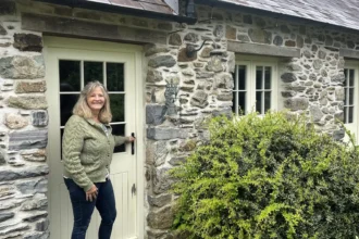A woman turned an old milking parlour in her garden into a holiday let to top up her pension - then the council slapped her with a £9,000 tax bill.