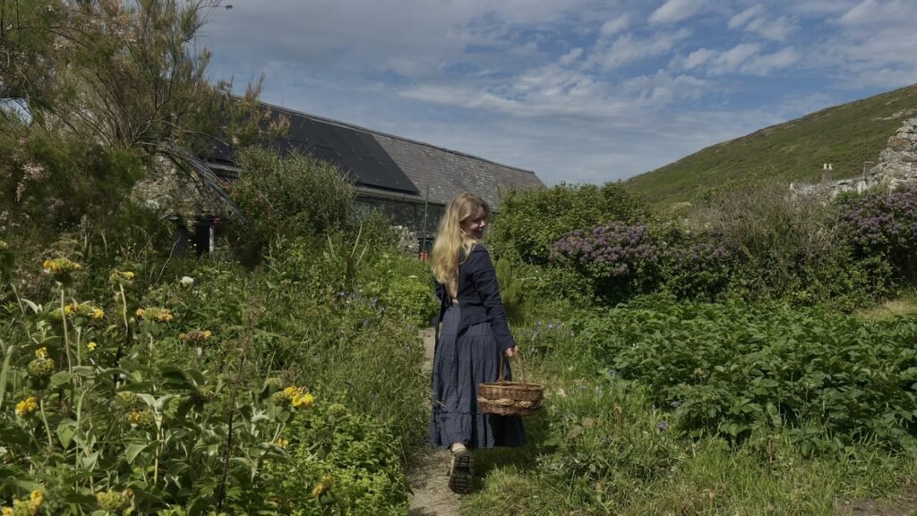Couple ditch city life for a tiny off-grid Welsh island with just four residents and 500 sheep, saving half their salary thanks to rock-bottom living costs.