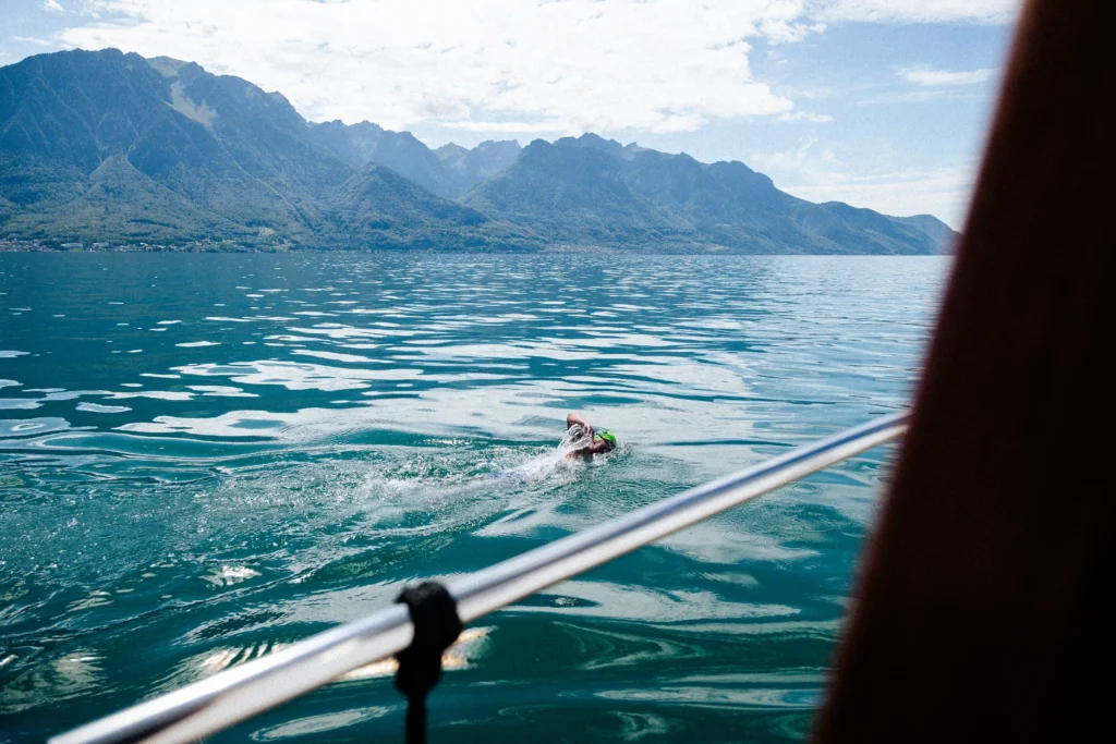 British dad becomes the first to swim Switzerland's 10 biggest lakes - 233 miles of freezing water for the charity that helped his son.