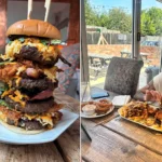 Brits have been beaten by one of the UK's biggest gut-busting burgers - a 5,000-calorie tower of beef, chicken, cheese, bacon and onion rings with a £100 prize.