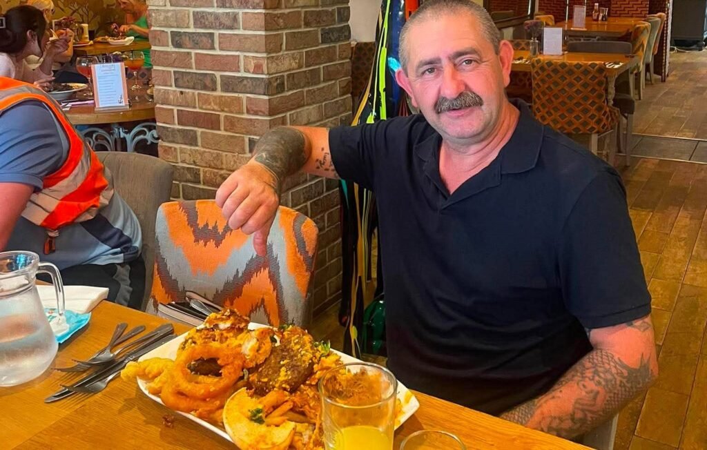 Brits have been beaten by one of the UK's biggest gut-busting burgers - a 5,000-calorie tower of beef, chicken, cheese, bacon and onion rings with a £100 prize.