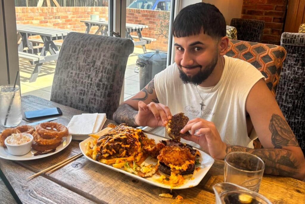 Brits have been beaten by one of the UK's biggest gut-busting burgers - a 5,000-calorie tower of beef, chicken, cheese, bacon and onion rings with a £100 prize.