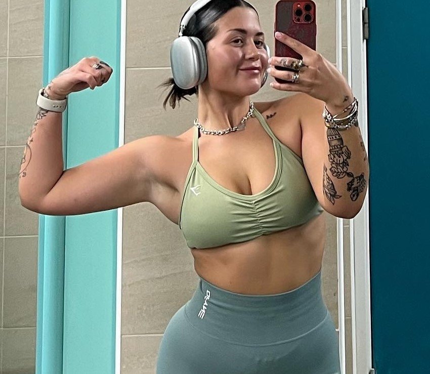 Woman who thought she would never have abs due to genetics went from a size 14 to XS with a ripped six-pack - and insists the secret is not in the gym but the kitchen.