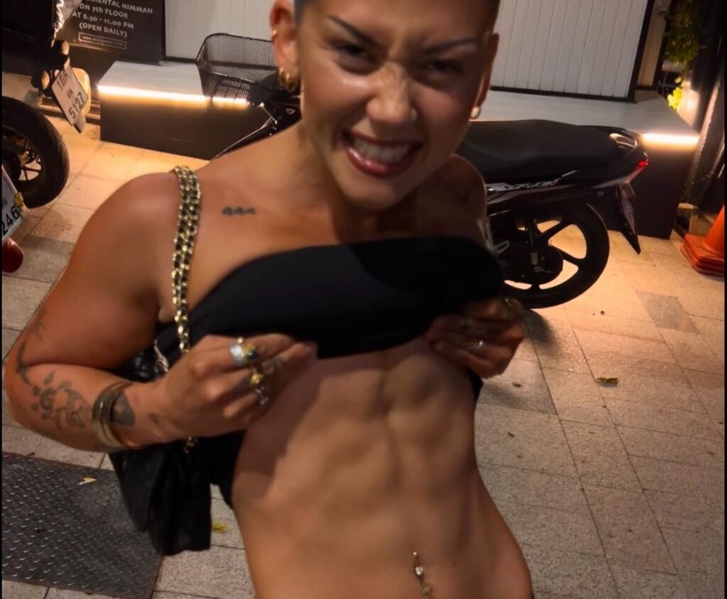 Woman who thought she would never have abs due to genetics went from a size 14 to XS with a ripped six-pack - and insists the secret is not in the gym but the kitchen.