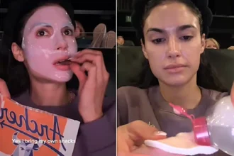 Beauty influencer is slammed as tacky and inconsiderate after filming herself doing an elaborate skincare routine - including a full sheet mask - during the three-hour movie The Odyssey.