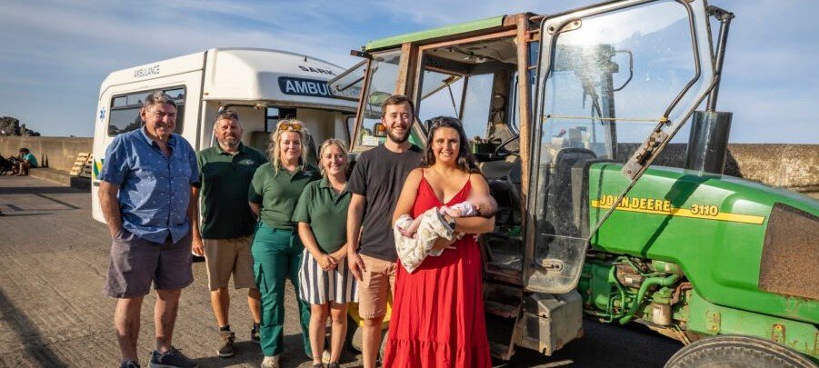 A baby girl named Harriet was born on a marine ambulance racing between Channel Islands during a lightning storm - arriving at 11:11pm, two weeks earlier than planned.
