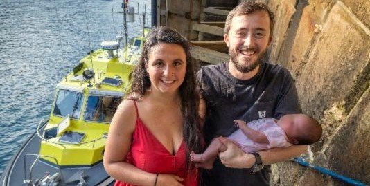 A baby girl named Harriet was born on a marine ambulance racing between Channel Islands during a lightning storm - arriving at 11:11pm, two weeks earlier than planned.