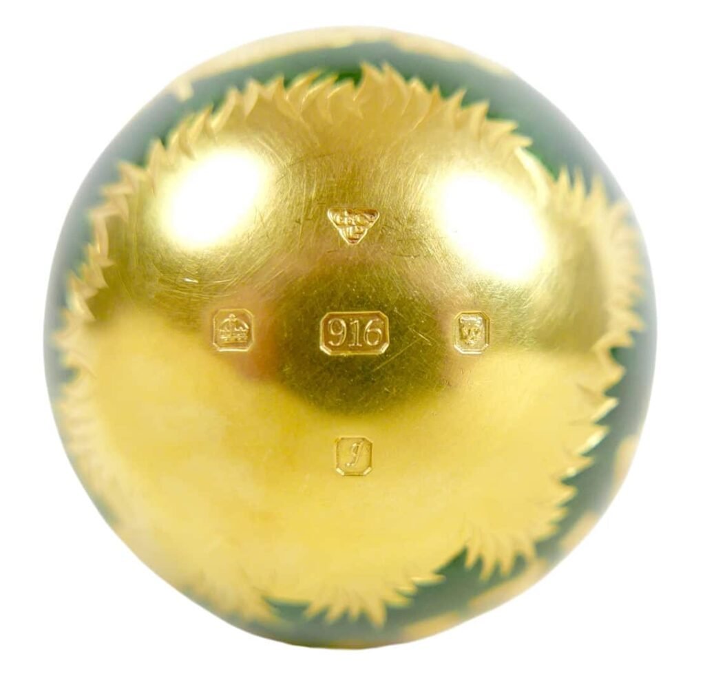 A rare solid gold Cadbury egg from the 1983 Conundrum treasure hunt has sold for a staggering £123,500 - smashing a world auction record and its estimate six times over.
