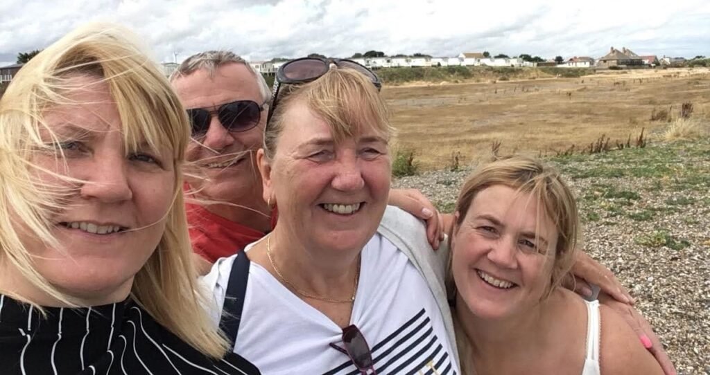 A woman inspired to make the most of life after losing her father before his retirement has visited 57 cities before her 50th birthday - on trips costing under £120.
