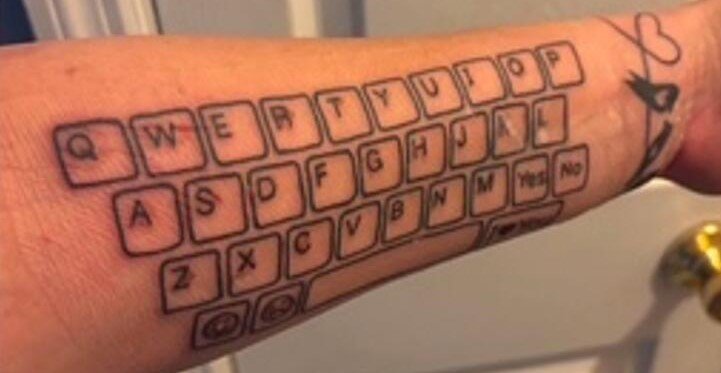 A devoted mum tattooed an entire keyboard on her arm so her non-speaking son can always talk to her - and his first typed words left her in tears.