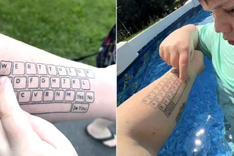 A devoted mum tattooed an entire keyboard on her arm so her non-speaking son can always talk to her - and his first typed words left her in tears.