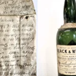 A workman's message in a whisky bottle, bricked up behind a Derby staircase in 1959, has been found 67 years on - a poignant note to whoever would one day uncover it.