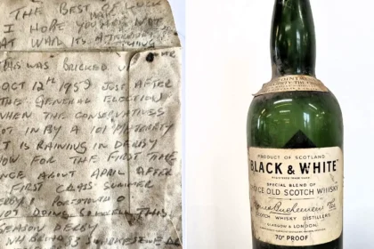 A workman's message in a whisky bottle, bricked up behind a Derby staircase in 1959, has been found 67 years on - a poignant note to whoever would one day uncover it.