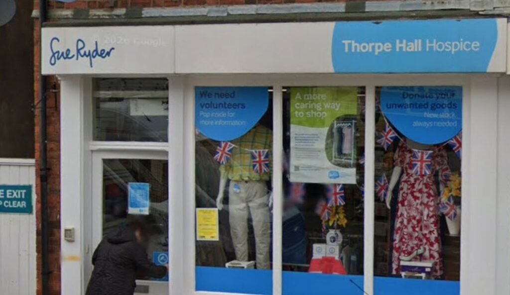 Six ducks browse charity shop bargains before waddling off
