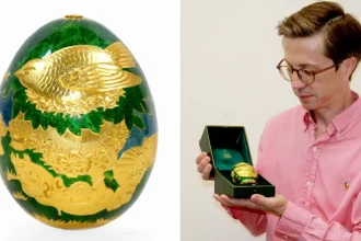 A rare solid gold Cadbury egg from the 1983 Conundrum treasure hunt has sold for a staggering £123,500 - smashing a world auction record and its estimate six times over.