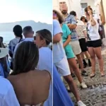 The grim reality of Santorini has been exposed as thousands of holidaymakers were spotted queueing at 6.30am for the same Instagram snap in front of the island's iconic blue dome.