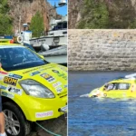 An amphibious ambulance car has sailed nine miles across the sea from Guernsey to Sark - taking three hours to complete the bizarre charity voyage.