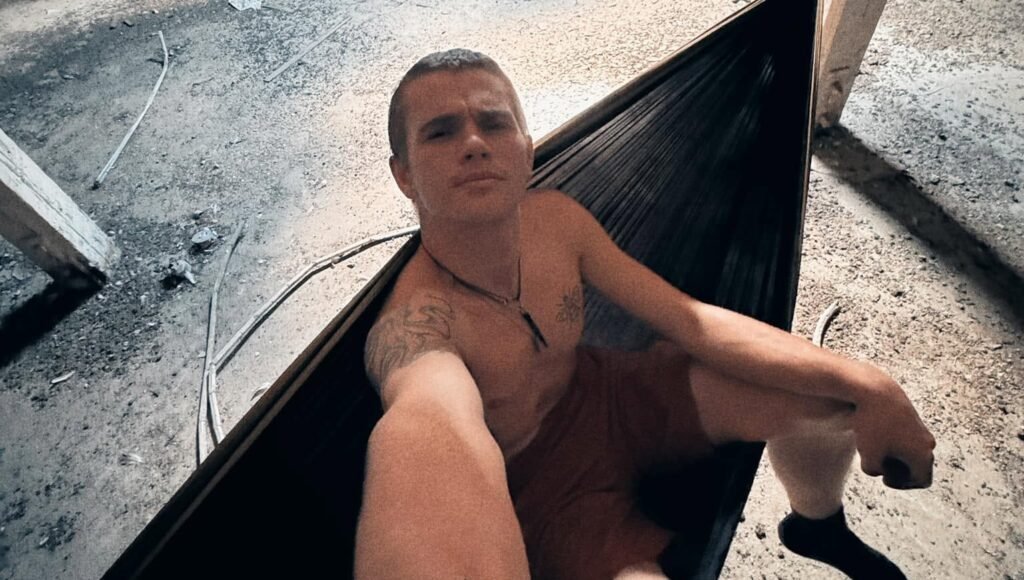 A British base jumper has landed himself in hot water after leaping off the San Siro at dawn - having spent the night hiding inside the empty football stadium.